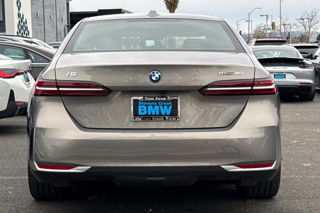 used 2024 BMW i5 car, priced at $61,397