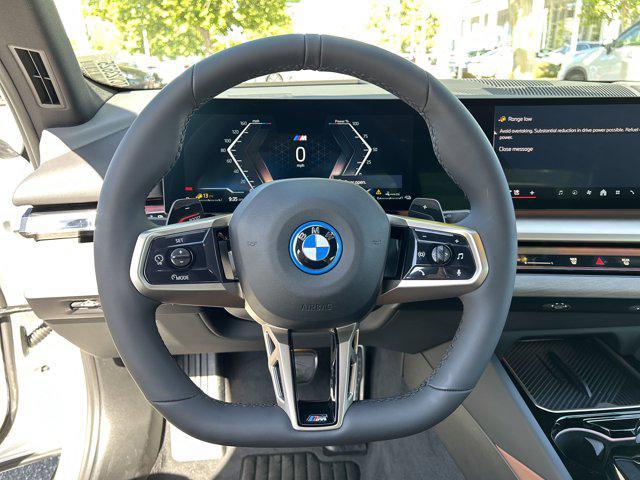 new 2026 BMW 550e car, priced at $81,275
