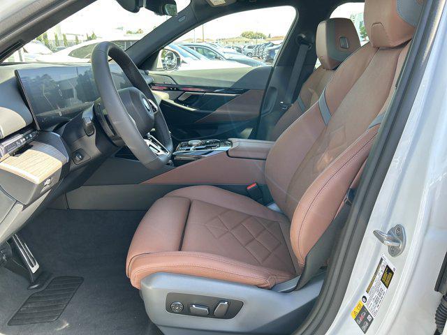 new 2026 BMW 550e car, priced at $81,275