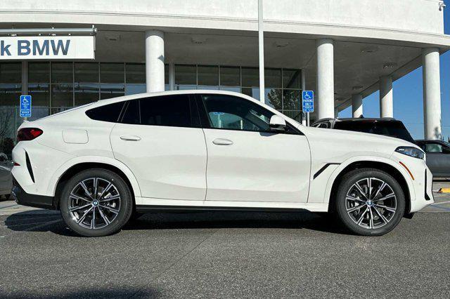 new 2025 BMW X6 car, priced at $81,710