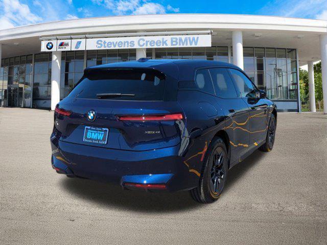 new 2026 BMW iX car, priced at $83,120
