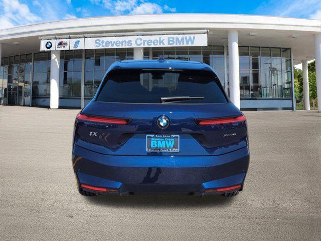new 2026 BMW iX car, priced at $83,120