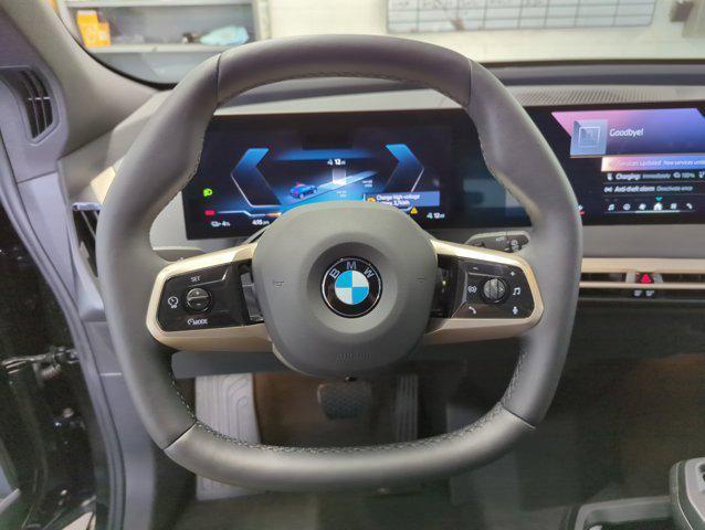 new 2026 BMW iX car, priced at $83,120