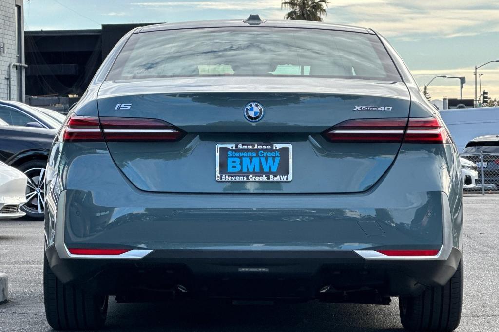 new 2025 BMW i5 car, priced at $74,670