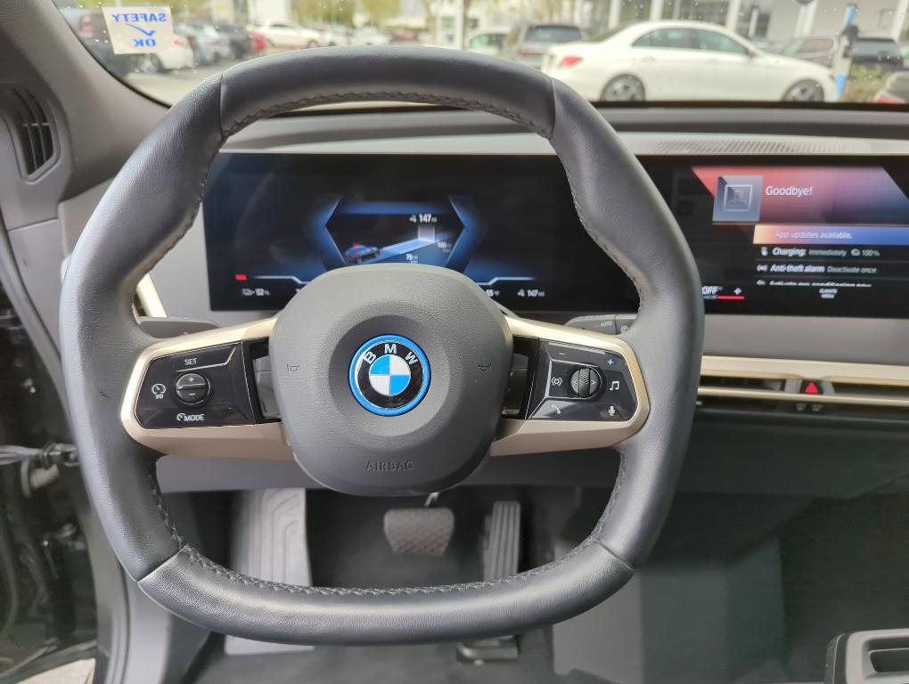 used 2023 BMW iX car, priced at $59,999