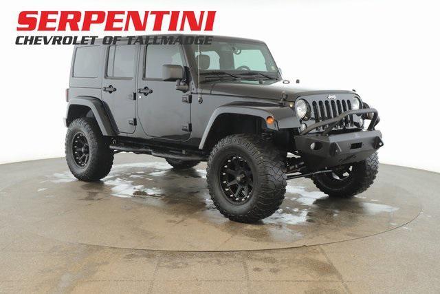 used 2014 Jeep Wrangler Unlimited car, priced at $20,994