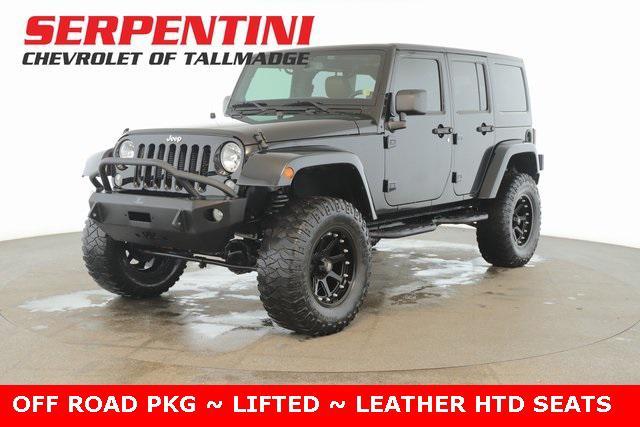 used 2014 Jeep Wrangler Unlimited car, priced at $21,338