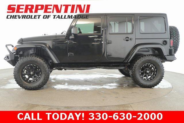 used 2014 Jeep Wrangler Unlimited car, priced at $20,994