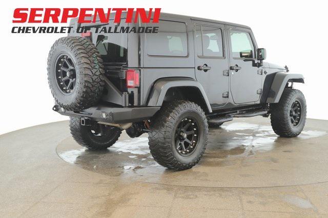 used 2014 Jeep Wrangler Unlimited car, priced at $20,994