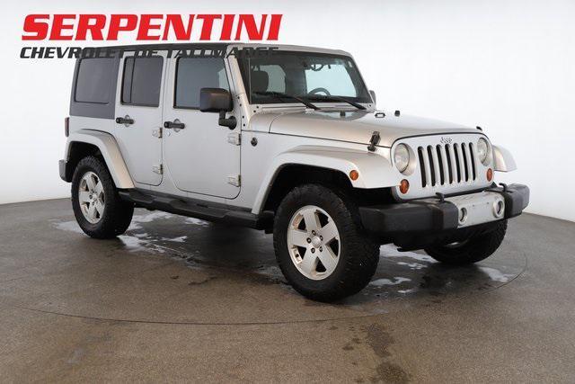 used 2011 Jeep Wrangler Unlimited car, priced at $17,849