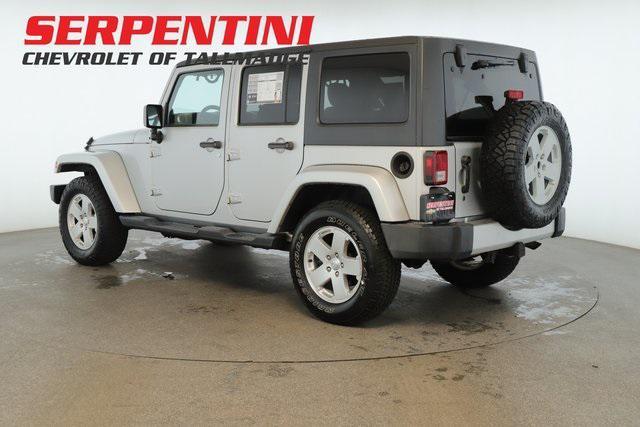 used 2011 Jeep Wrangler Unlimited car, priced at $16,899