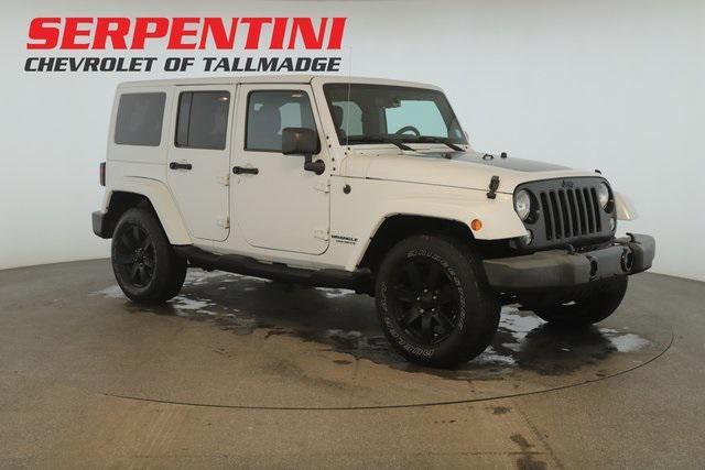 used 2014 Jeep Wrangler Unlimited car, priced at $21,136