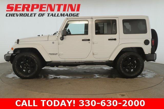 used 2014 Jeep Wrangler Unlimited car, priced at $21,136