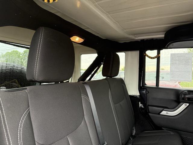 used 2017 Jeep Wrangler Unlimited car, priced at $25,177