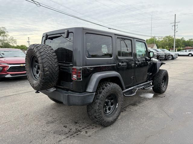 used 2017 Jeep Wrangler Unlimited car, priced at $25,177