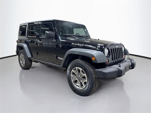 used 2013 Jeep Wrangler Unlimited car, priced at $21,250