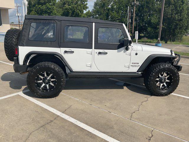 used 2016 Jeep Wrangler Unlimited car, priced at $22,733