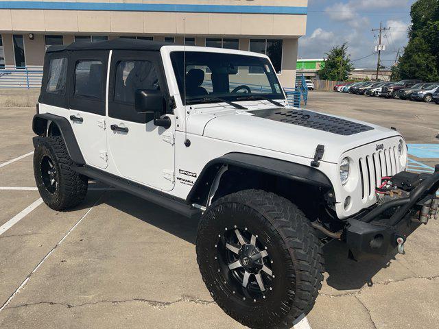 used 2016 Jeep Wrangler Unlimited car, priced at $22,733