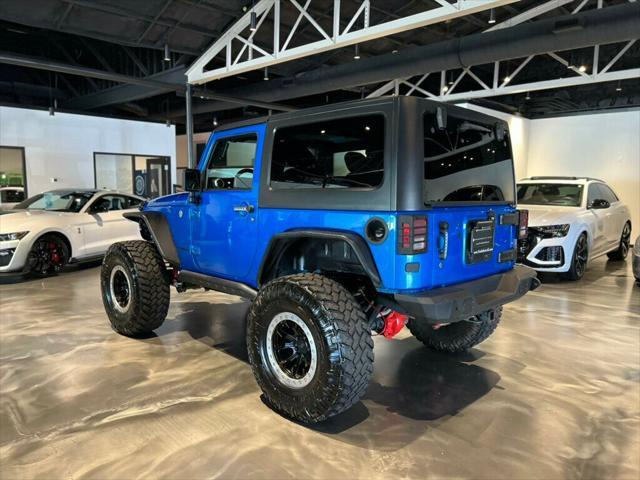 used 2016 Jeep Wrangler car, priced at $21,881