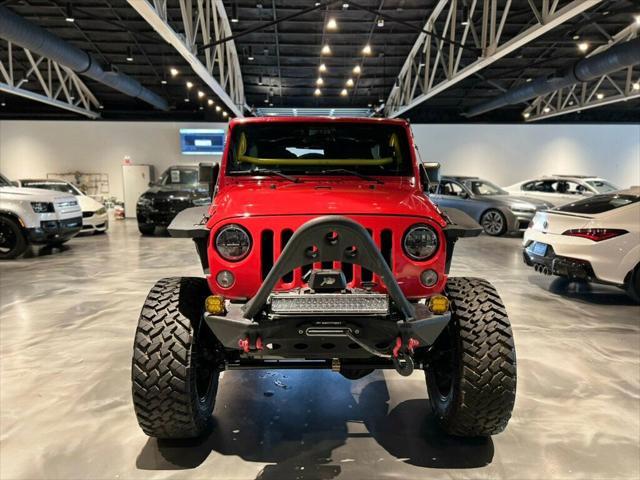 used 2014 Jeep Wrangler Unlimited car, priced at $36,881