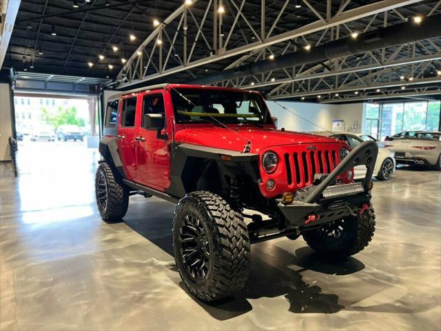 used 2014 Jeep Wrangler Unlimited car, priced at $33,881