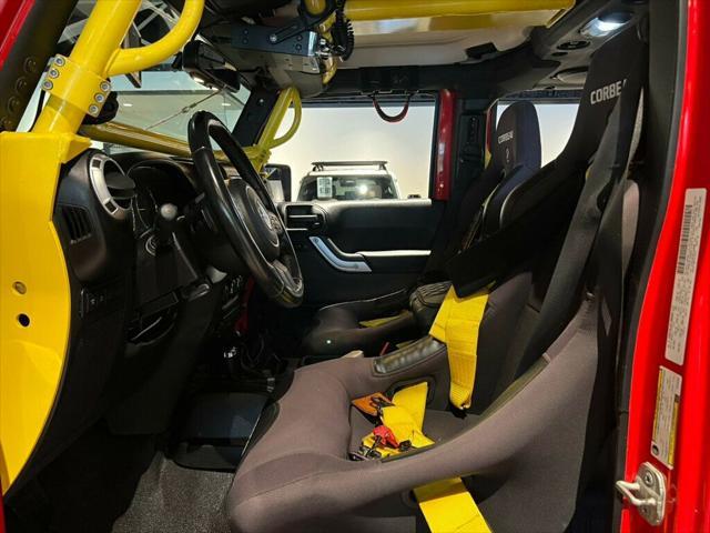 used 2014 Jeep Wrangler Unlimited car, priced at $36,881