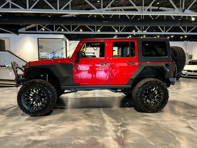used 2014 Jeep Wrangler Unlimited car, priced at $36,881