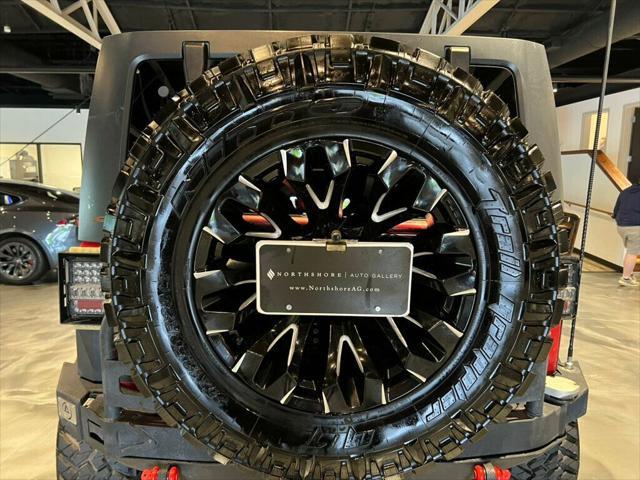 used 2014 Jeep Wrangler Unlimited car, priced at $33,881