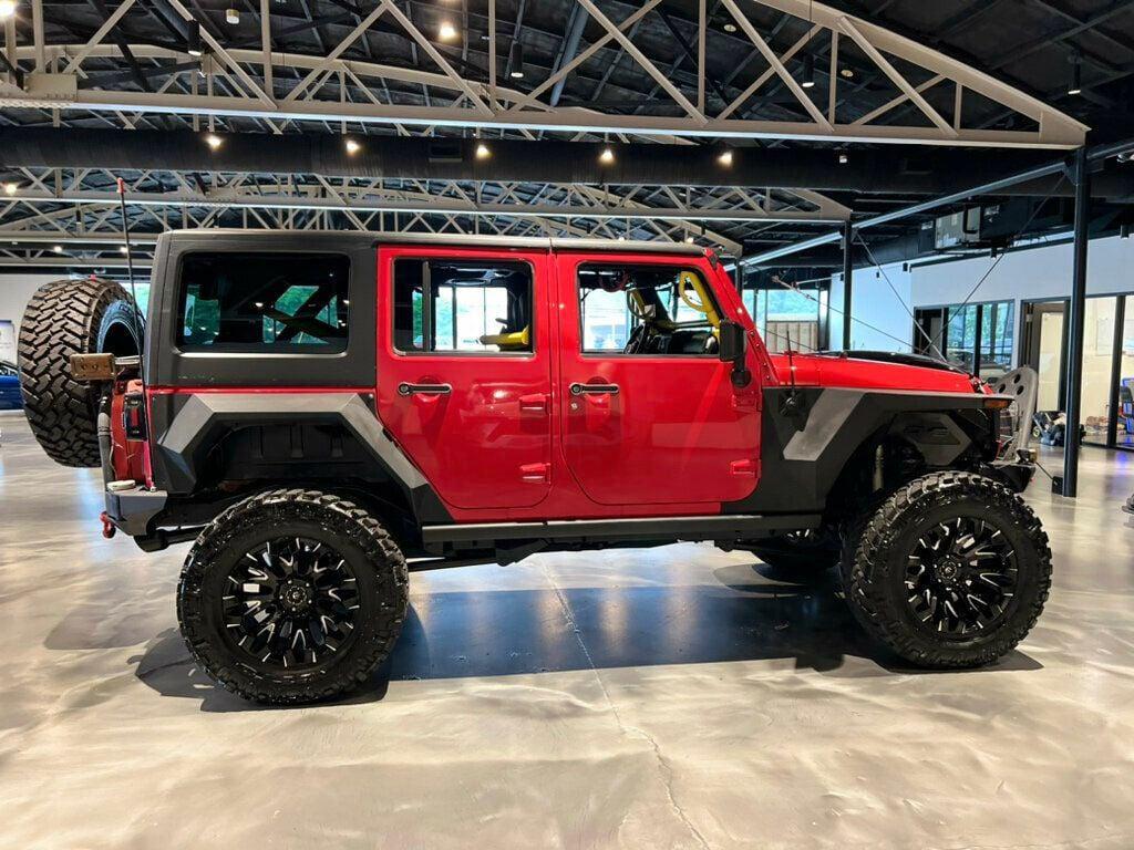 used 2014 Jeep Wrangler Unlimited car, priced at $26,881