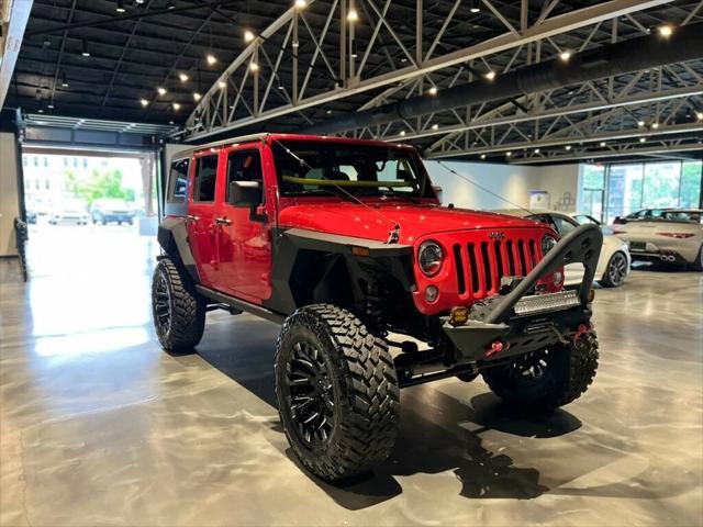 used 2014 Jeep Wrangler Unlimited car, priced at $36,881