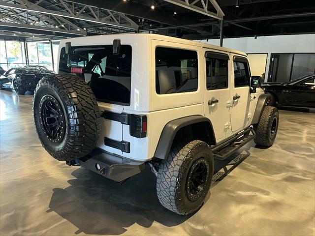 used 2015 Jeep Wrangler Unlimited car, priced at $20,881