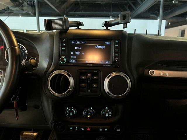 used 2015 Jeep Wrangler Unlimited car, priced at $20,881