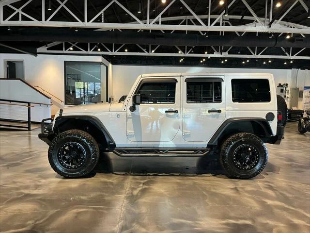 used 2015 Jeep Wrangler Unlimited car, priced at $20,881