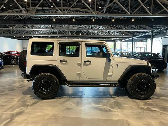 used 2015 Jeep Wrangler Unlimited car, priced at $20,881