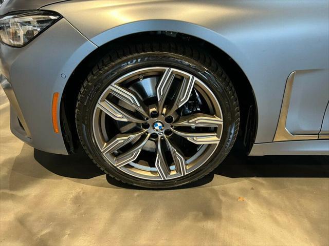 used 2022 BMW M760 car, priced at $78,581