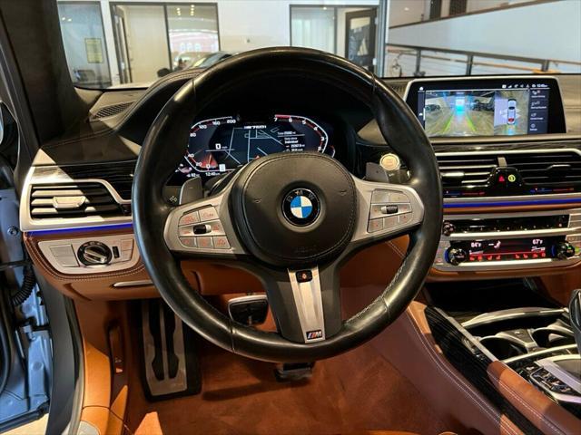used 2022 BMW M760 car, priced at $78,581