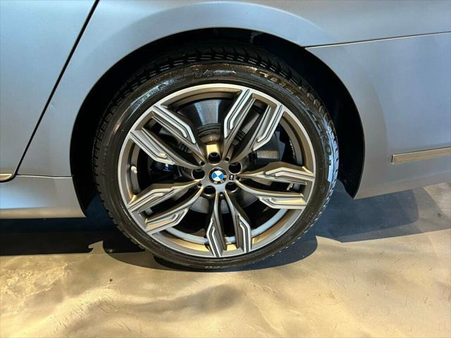 used 2022 BMW M760 car, priced at $78,581