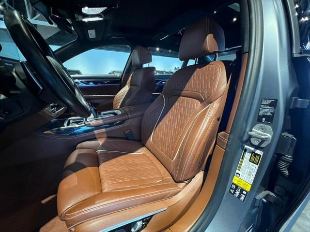 used 2022 BMW M760 car, priced at $78,581