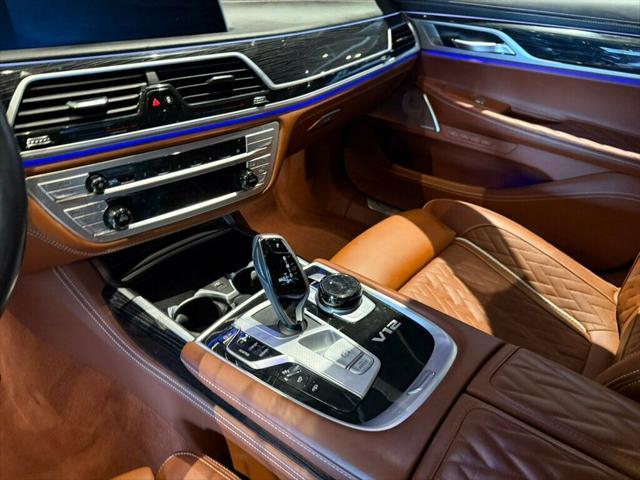 used 2022 BMW M760 car, priced at $79,881