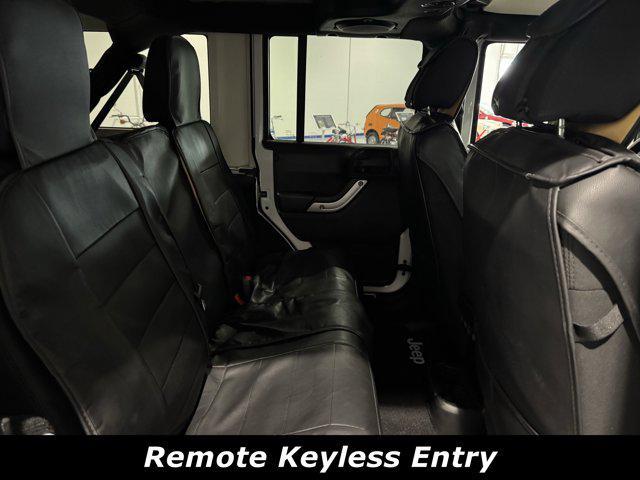 used 2012 Jeep Wrangler Unlimited car, priced at $18,419