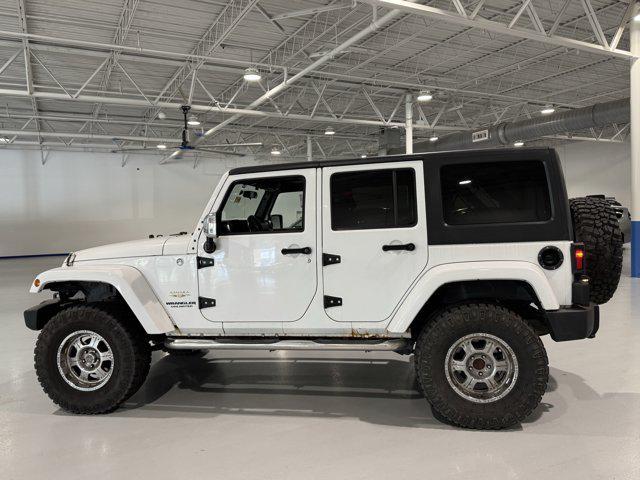 used 2012 Jeep Wrangler Unlimited car, priced at $18,419