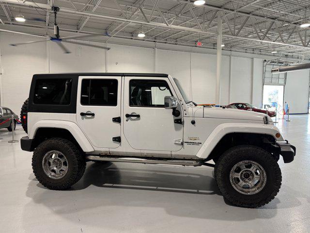 used 2012 Jeep Wrangler Unlimited car, priced at $18,419