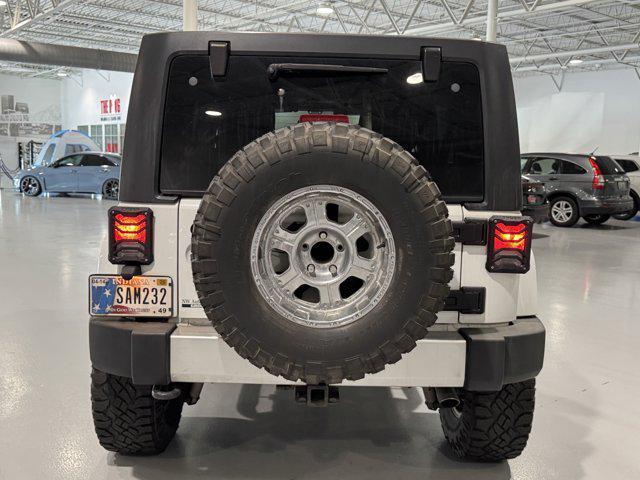 used 2012 Jeep Wrangler Unlimited car, priced at $18,419