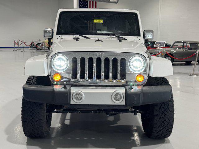 used 2012 Jeep Wrangler Unlimited car, priced at $18,419