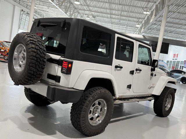 used 2012 Jeep Wrangler Unlimited car, priced at $18,419