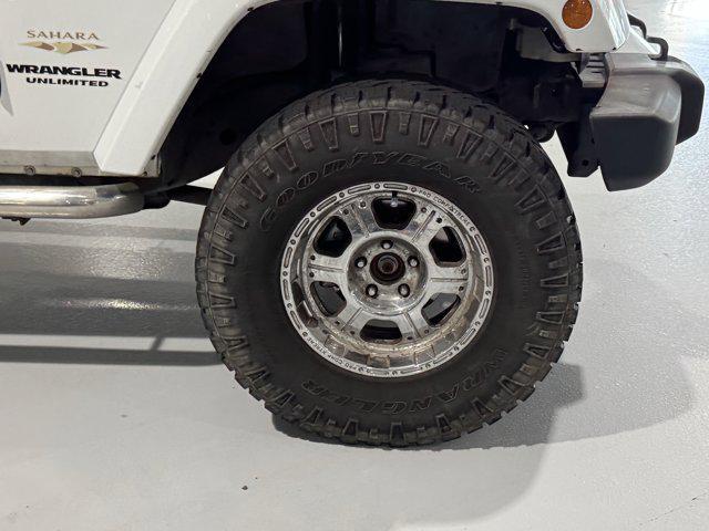 used 2012 Jeep Wrangler Unlimited car, priced at $18,419
