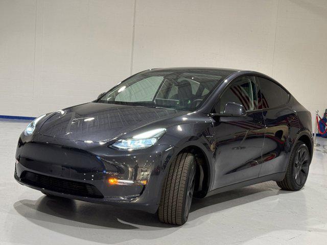 used 2024 Tesla Model Y car, priced at $36,609