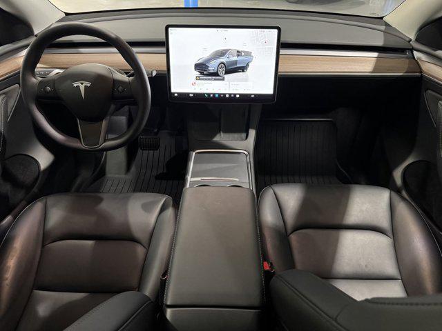 used 2024 Tesla Model Y car, priced at $36,609