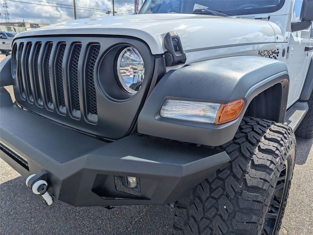 used 2023 Jeep Wrangler car, priced at $28,299