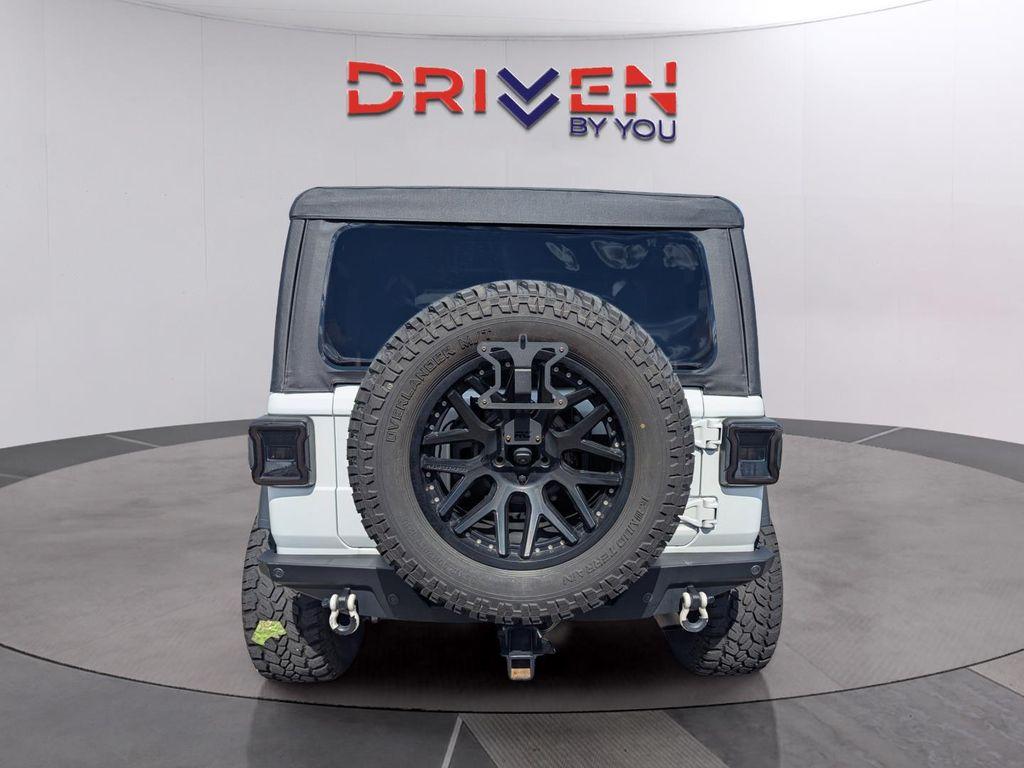 used 2023 Jeep Wrangler car, priced at $28,299